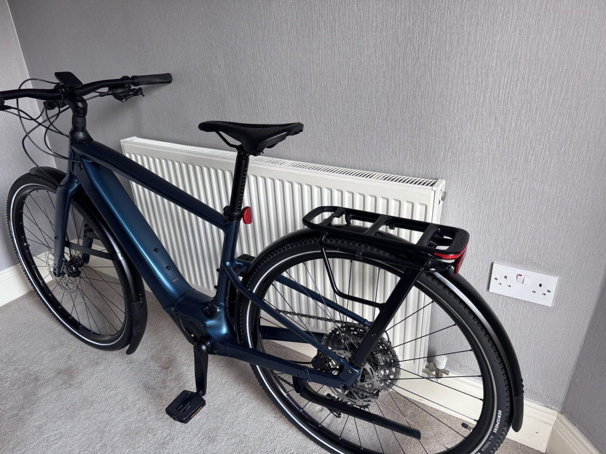 Nearly New Specialized Turbo Vado SL 2 5.0 Medium bike for sale with warranty.