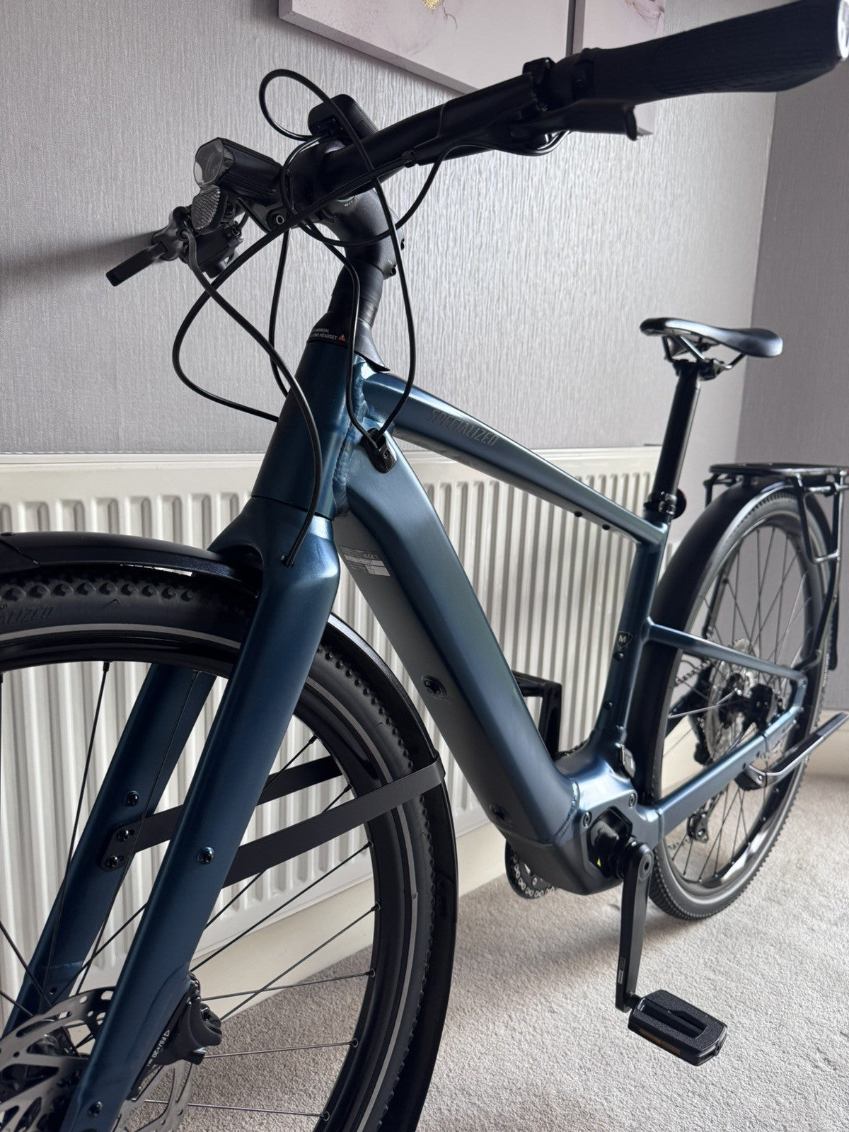 Nearly New Specialized Turbo Vado SL 2 5.0 Medium bike for sale with warranty.