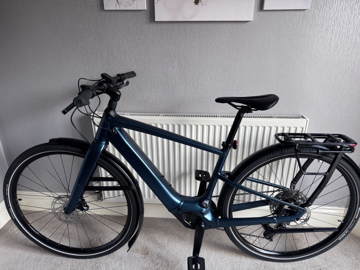 Nearly New Specialized Turbo Vado SL 2 5.0 Medium bike for sale with warranty.